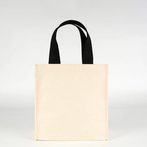 Blank 320 gsm cotton canvas tote bag standing upright, full gusset visible