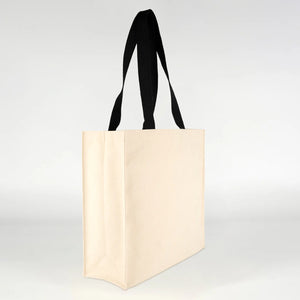 Heavyweight 320 gsm natural canvas tote bag held to show full size