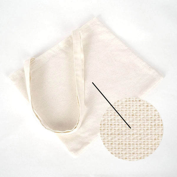 Beige fabric with a textured pattern on a white background